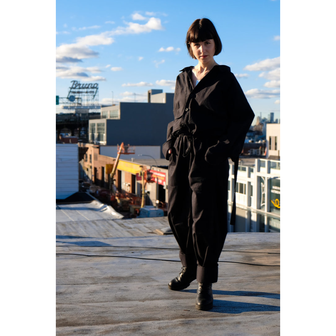 jumpsuit with gathering across the back and multiple pockets