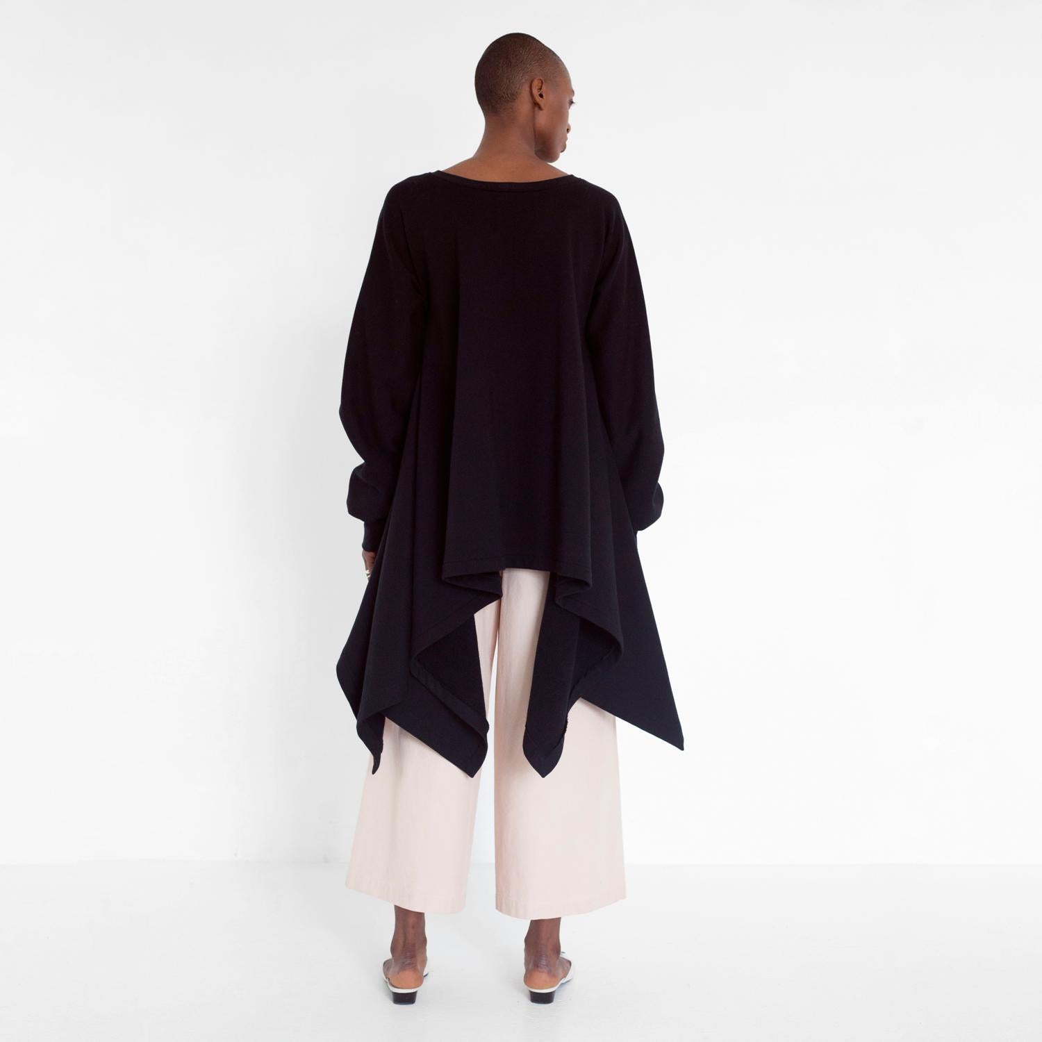 flowing oversized sweater with ruffled sleeves by Natascha von Hirschhausen fashion design made in Berlin