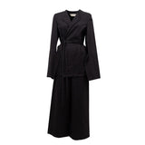 sophisticated pants suit with herringbone pattern by Natascha von Hirschhausen fashion design made in Berlin