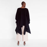 flowing oversized sweater with ruffled sleeves by Natascha von Hirschhausen fashion design made in Berlin